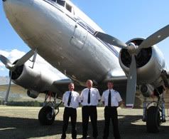 GRAND DAME: From left, pilots Chris Mehlhopt, Giles Goulden and Myles Coburn and a 66-year-old DC3 at Lowburn airstrip. — JOHN EDENS/The Southland Times.