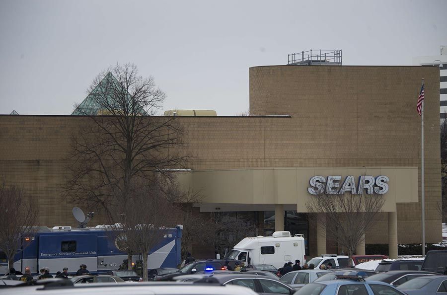 Police patrol outside a Sears store at Columbia Mall after a fatal shooting on January 25th, 2014, in Columbia, Maryland. Three people were killed in a shooting at the popular shopping mall, located about 45 minutes outside Washington, authorities said on Saturday. Howard County, Maryland, Police announced the fatalities and urged people inside the Mall “to stay in place”. Police said one of the dead was “located near a gun and ammunition”. — Photo: Jim Watson/AFP/Getty Images.