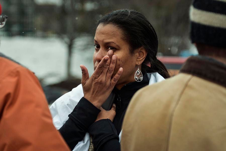 Tarah William of Lanham, Maryland reacts after she was evacuated from a building following a shooting at a shopping mall in Columbia, Maryland on January 25th, 2014. Three people died in a shooting at a large shopping mall outside of Baltimore, Maryland, on Saturday, and one of the dead was believed to be the shooter, police said. — Photo:  James Lawler Duggan/Reuters.
