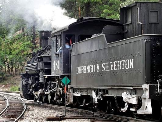 Durango & Silverton Narrow Gauge Railroad locomotive 480 tows a coal car to Silverton after stopping in Rockwood. Fireman Isaac Randolph spent the day shoveling coal, the engine's fuel.