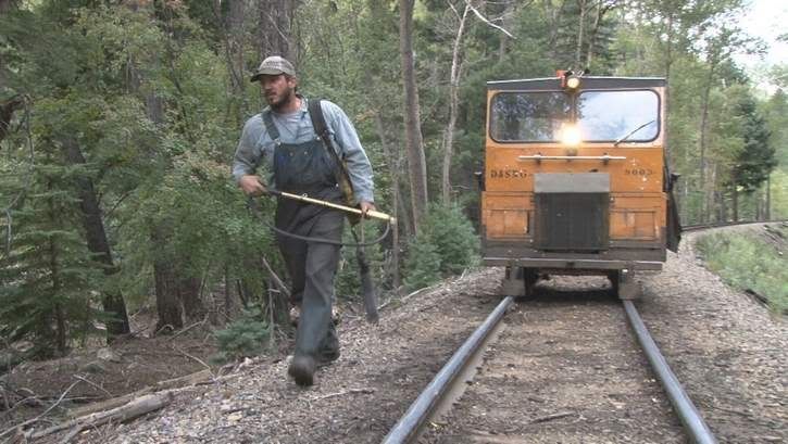 Maintenance-of-way patrolman Dave Unterreiner walks along the rails of the Durango & Silverton Narrow Gauge Railroad in early September in search of spot fires that may have been started by the passing train.  Photo: SHAUN STANLEY/The Durango Herald.