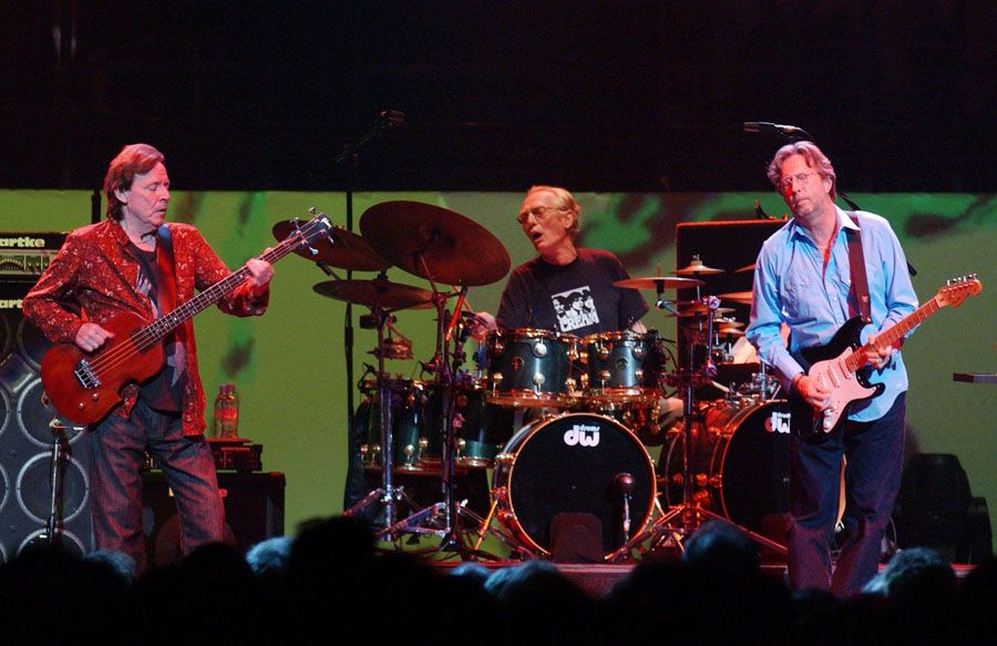 Bassist Jack Bruce, left, drummer Ginger Baker and Eric Clapton of Cream perform live onstage at London's Royal Albert Hall in 2005 during their first reunion concert. The band broke up in 1968. — Photo: Yui Mok/Associated Press.