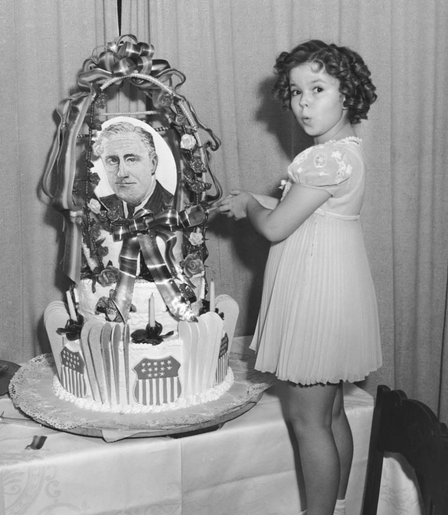 On January 31st, 1938, Shirley Temple, a mere nine years old but the top box–office attraction of 1938, cuts the cake at a party celebrating the 55th birthday of president Franklin D. Roosevelt. A trainload of Hollywood stars and moguls traveled from California to the nation's capital for the event. — Photo: Los Angeles Times archives.