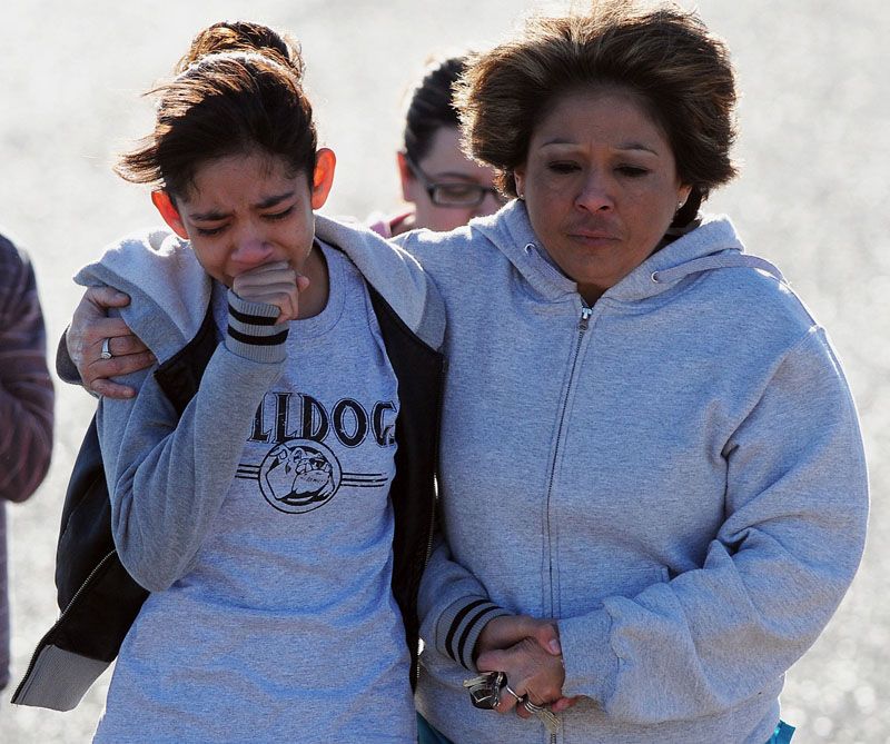 A student is comforted after a shooting on Tuesday at Berrendo Middle school in Roswell, New Mexico. — Photo: Mark Wilson/Roswell Daily Record.