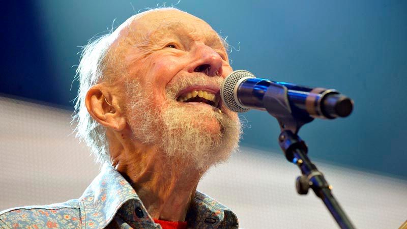 Pete Seeger performing on stage during the Farm Aid 2013 concert at Saratoga Performing Arts Center in Saratoga Springs, New York. — Photo: Hans Pennink/Associated Press.