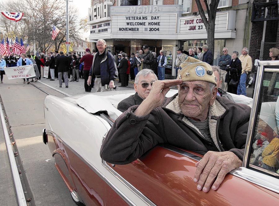 William “Wild Bill” Guarnere participates in the Veterans Day parade in Media, Pennsylvania, in 2004. Guarnere was one of the World War II veterans whose exploits were dramatized in the TV mini-series “Band of Brothers”. — Photo: Jacqueline Larma/Associated Press/November 11th, 2004.