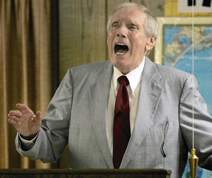 Fred Phelps preaching at Westboro Baptist Church in Topeka, Kansas. "You can't preach the Bible without preaching hate," he once said. — Photo: Charlie Riedel/Associated Press.