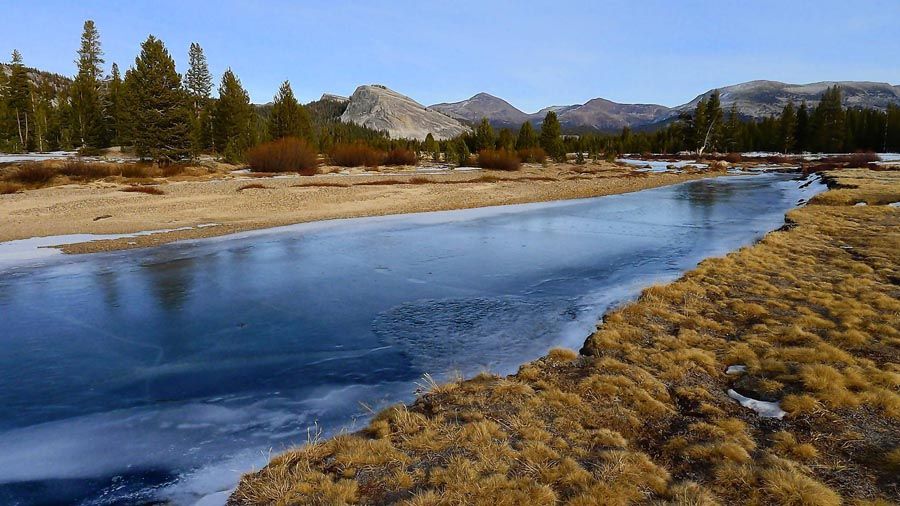 The Tuolumne River in Yosemite National Park on January 3rd, 2012, reveals a landscape usually frozen and covered with snow at that time of year. Several evidences of climate change that state scientiests cited were from the Sierra Nevada, including reduced spring runoff. — Photo: Brian van der Brug/Los Angeles Times.