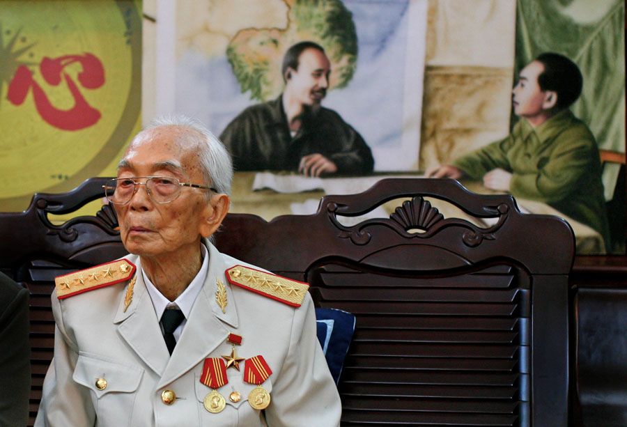 Vietnamese General Vo Nguyen Giap is seen in front of a painting of himself and president Ho Chi Minh, left, at his home in Hanoi, Vietnam in this picture taken August 25th 2008, his 97th birthday. Officials say Giap, the military mastermind who drove the French and the Americans out of Vietnam, has died at age 102. He was the country's last famous communist revolutionary, and used ingenious guerrilla tactics to overcome enormous odds against superior forces. — Photo: Na Son Nguyen/Associated Press.