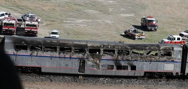 Passenger Abel Ortiz said he was sleeping on the side of the car that was struck. “I saw the flames come over the windows of the side, like a quick flash of flames. Then smoked filled up everything. There was some screaming.” — Photo: Marilyn Newton/Associated Press/June 24, 2011.