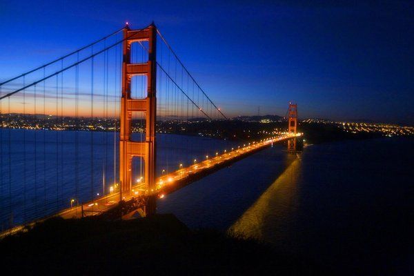 The Golden Gate Bridge greets the dawn in San Francisco. The famed span is getting a visitors center.  Photo: Los Angeles Times/May 16, 2012.
