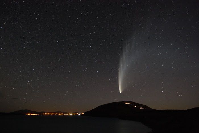 HEAVENLY COMET: Comet McNaught pays a spectacular visit in 2007 and was caught from Godley Peaks Road, looking back south over Mount John and Tekapo Village. — FRASER GUNN.