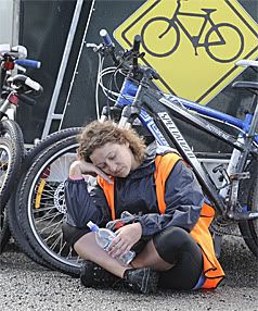 BREATHER: Australian Bruna Lisciotto takes a break after a ride from Manapouri to Te Anau as part of an Active New Zealand tour. — BARRY HARCOURT/The Southland Times.