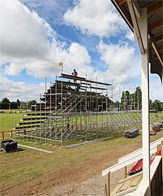 LET THE BUILDING BEGIN: Construction is under way to have a Mangatainoka paddock ready to host a pre-season Super 14 game next weekend.  MURRAY WILSON/Manawatu Standard.