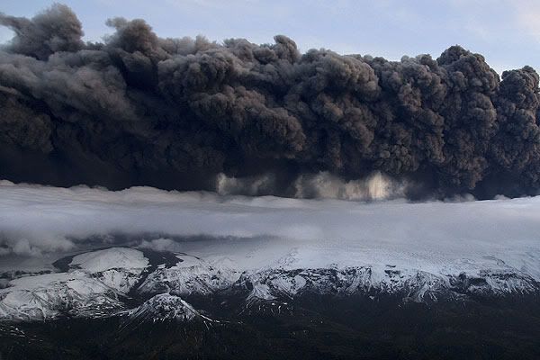 ASH CLOUD: A plume of volcanic ash rises six to 11km into the atmosphere, from a crater under 200m of ice at the Eyjafjallajokull glacier in southern Iceland.  REUTERS.