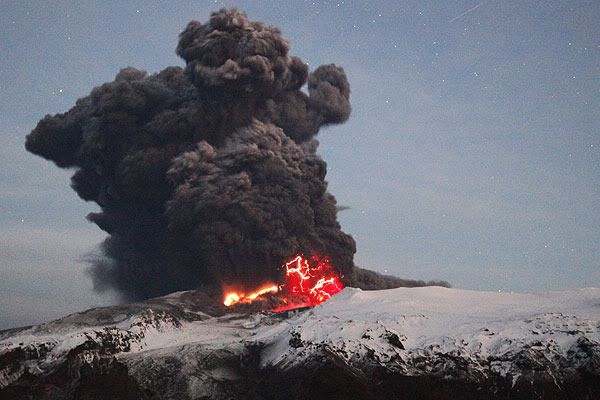 LAVA FLOW: Lava spews from a volcano in Eyjafjallajokull.  REUTERS.