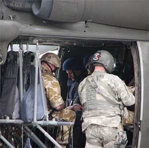 Prime Minister John Key in a helicopter on the way to visit SAS troops in Kabul.  Photo: NZPA.