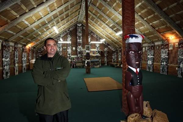 THE ESSENCE OF TUHOE: Original carvings, paintings and tukutuku panelling line the walls of Mataatua Marae at Ruatahuna. Rangi Mataamua is particularly proud of a carving of his ancestor Whitiaua, adorned with a waistcoat and tie. — PETER DRURY/Waikato Times.