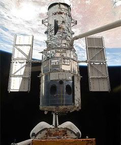 TO BOLDLY FILM: The Hubble space telescope, as seen from the space shuttle Atlantis.  Photo: NASA.