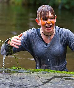 SODDEN: Lucy Picott after she was thrown into the pond.  ROBERT KITCHIN/Manawatu Standard.