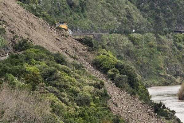SLIP STOP: A freight train carrying milk to Taranaki hit a landslide in the Manawatu Gorge. — WARWICK SMITH/Manawatu Standard.