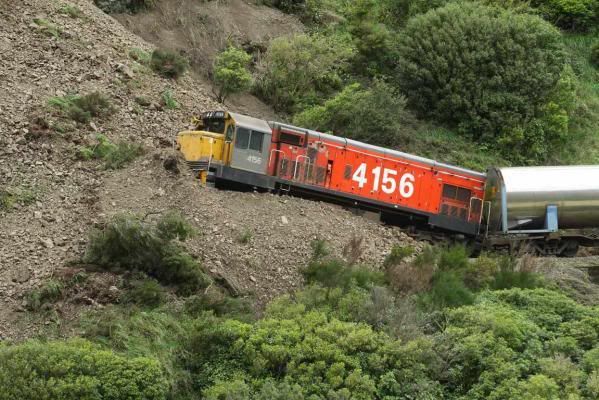 SLIP STOP: A freight train carrying milk to Taranaki hit a landslide in the Manawatu Gorge. — WARWICK SMITH/Manawatu Standard.