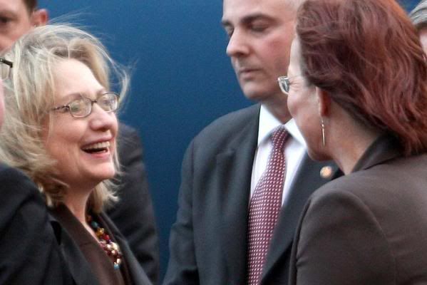 Hillary Clinton and Celia Wade-Brown shake hands at Wellington Airport.