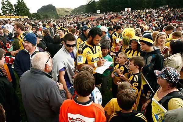 Victor Vito signs autographs after the game.  PHIL REID/The Dominion Post.