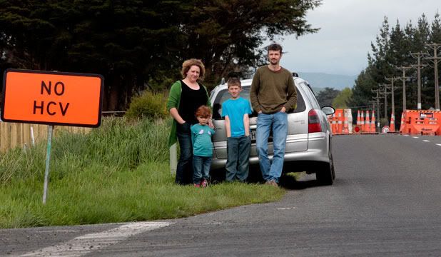 NO GO ZONE: Standing at the roading detour are the Vink family of Woodville, from left, Helen, Eva, 5, Noah, 9, and Daan.  WARWICK SMITH/Fairfax NZ.