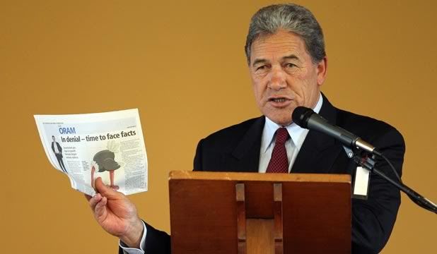 POLITICAL FUEL: Winston Peters uses a Sunday Star-Times column by Rod Oram to make a point in Pukekohe last week.  MICHAEL BRADLEY/Fairfax NZ.