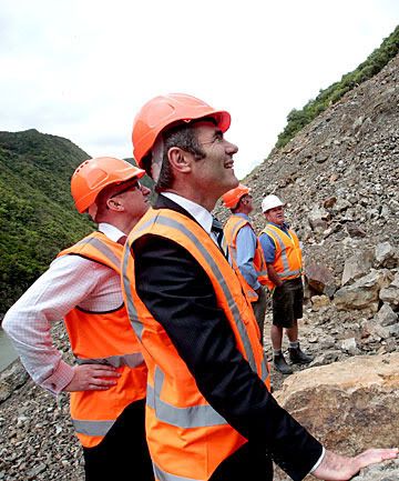 HUGE TASK: Associate Transport Minister Nathan Guy, foreground, and New Zealand Transport Agency state highways manager David McGonigal discuss the extent of the gorge slip.  WARWICK SMITH/Fairfax NZ.