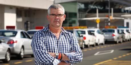 Mike Beauchamp at the taxi rank at Auckland Airport. — Photo: Sarah Ivey.
