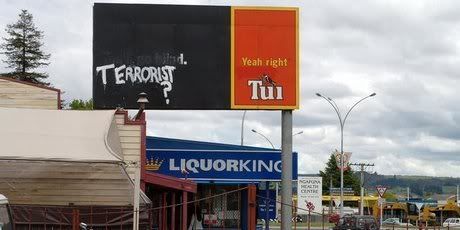 Rotorua locals put their own spin on an advertising sign after the Urewera raids. — Photo: APN.