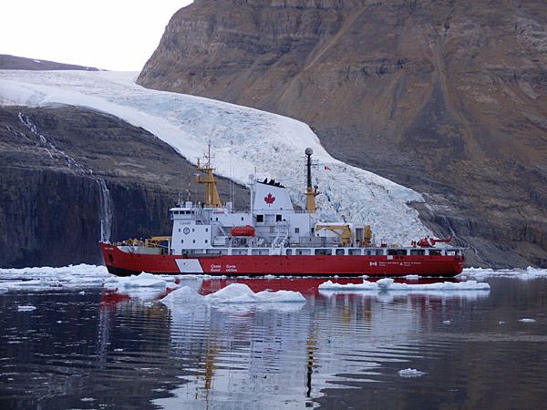 The Canadian Coast Guard Service vessel Henry Larsen is shown at the entrance of Petermann Fjord. The glacier in the background is a tiny, tiny side arm that feeds into Petermann Glacier. There are hundreds of these, University of Delaware's Andreas Muenchow says. — Photo: Helen Johnson, Oxford University.