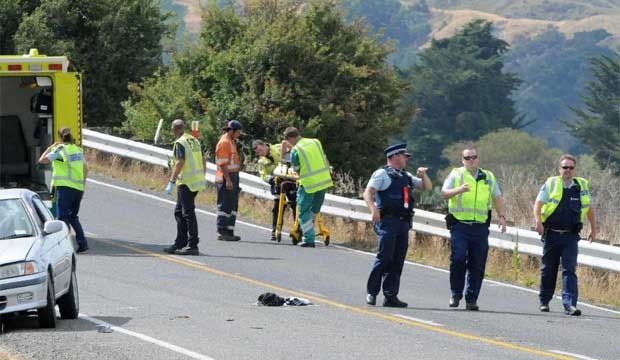CRASH SCENE: Emergency services attend a crash on State Highway 2 north of Masterton.