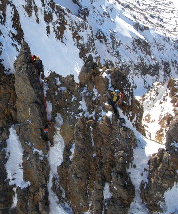 DRAMATIC RESCUE: A climber is helped to safety after a 5m fall on near vertical rock.