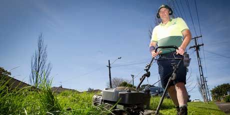 David Wright of Jim's Mowing says many retirees can't afford extra for berm mowing.  Photo: Sarah Ivey.