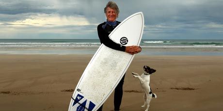 David Timbs enjoys an outing at Wainui Beach with his dog, Bosco.  Photo: Alan Gibson.