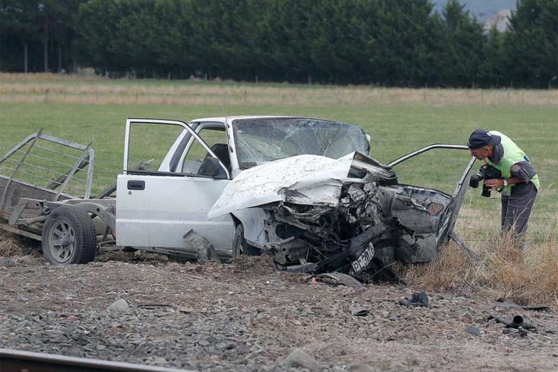 WRECKAGE: The scene of a crash involving a car and a train on Wiltons Road between Carterton and Masterton in which one person died and another was seriously injured.  MAARTEN HOLL/Fairfax NZ.