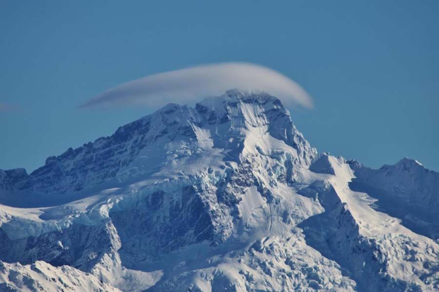 Mount Sefton is veiled by a stratocumulus lenticularis cloud.  Photo: GEORGE EMPSON.