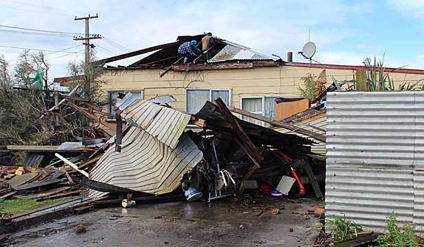 DESTRUCTION: A small tornado ripped Blaketown on the South Island's West Coast, damaging roofs and uprooting trees.  SARAH-JANE O'CONNOR/Fairfax NZ.