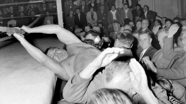 OFF THE MAT: Crowds loved the professional wrestling bouts staged at Wellington Town Hall in the 1960s.  Photo: ALEXANDER TURNBULL LIBRARY.
