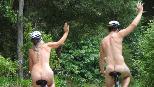 WORLD NAKED BIKE RIDE 2010: As this pair shows, helmets are important even if clothes are not.  Photo: HAYLEY GALE.