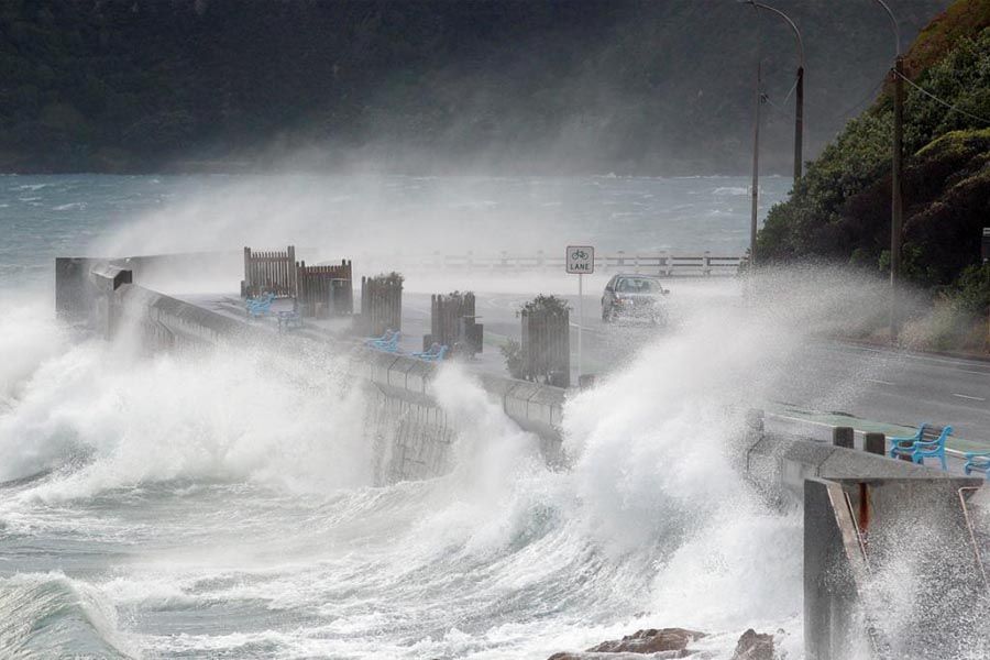 High tide and strong winds make trouble for motorists at Balaena Bay.  KEVIN STENT/Fairfax NZ.