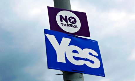 Yes and No Thanks signs on a lamppost in Blantyre, Scotland. — Photo: Murdo MacLeod/The Guardian.