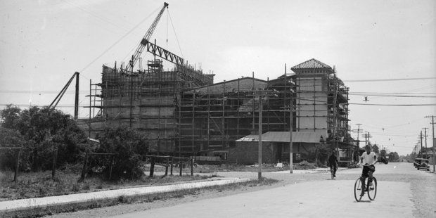 Work under way to restore the Municpal Theatre (as it was known) after the 1931 Hawke's Bay earthquake. — Photo: Alexander Turnbull Library.