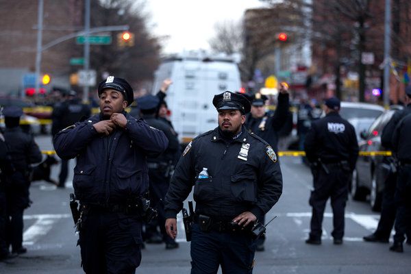 The shootings took place near Myrtle and Tompkins Avenues in Bedford-Stuyvesant. — Photo: Kevin Hagen/The New York Times.