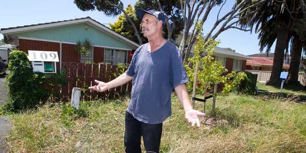 Chris Mills, who lives in a lawn-free Ellerslie property, has had an ongoing dispute with Auckland Transport over mowing the council's berm. — Photo: Richard Robinson.
