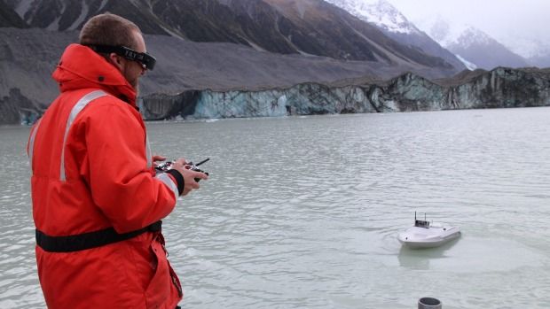REMOTE-CONTROL: University of Canterbury geography research technican Paul Bealing studies natural glacial process at the Tasman Glacier with the aid a hi-tech jetboat.