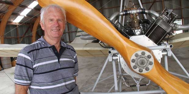 TEST RUN: Pilot Neville Hay, standing beside a replica Pither monoplane. He will taxi the Pearse monoplane on the day.